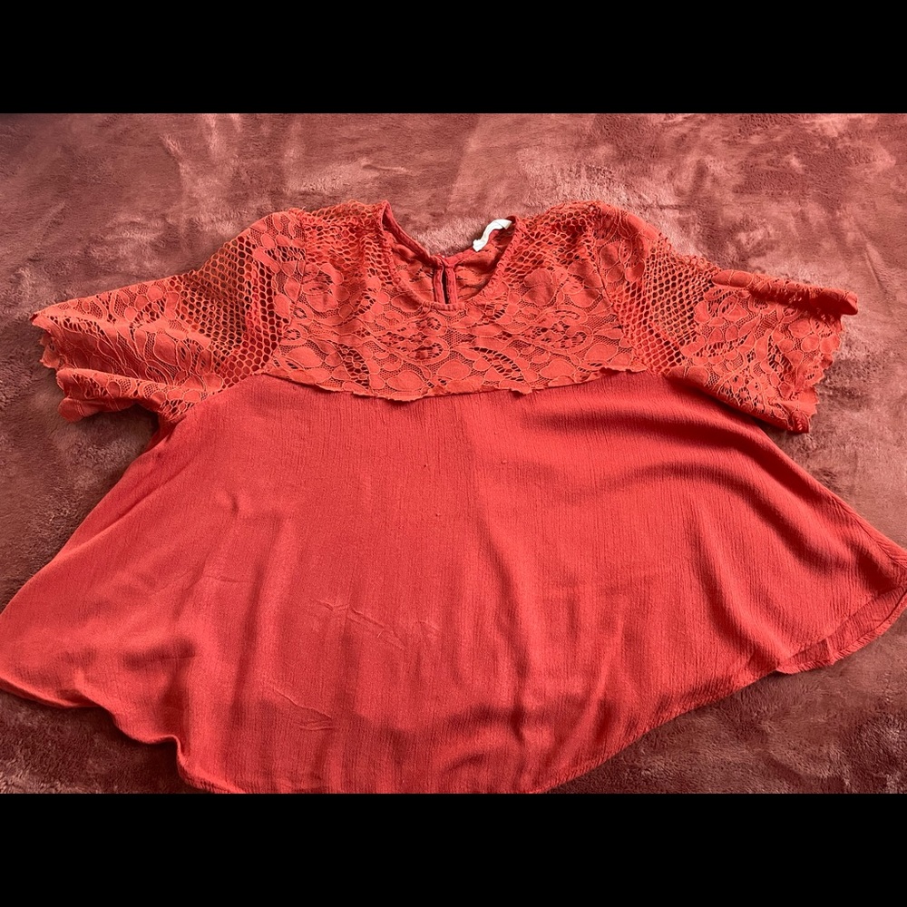 Dark orange top
